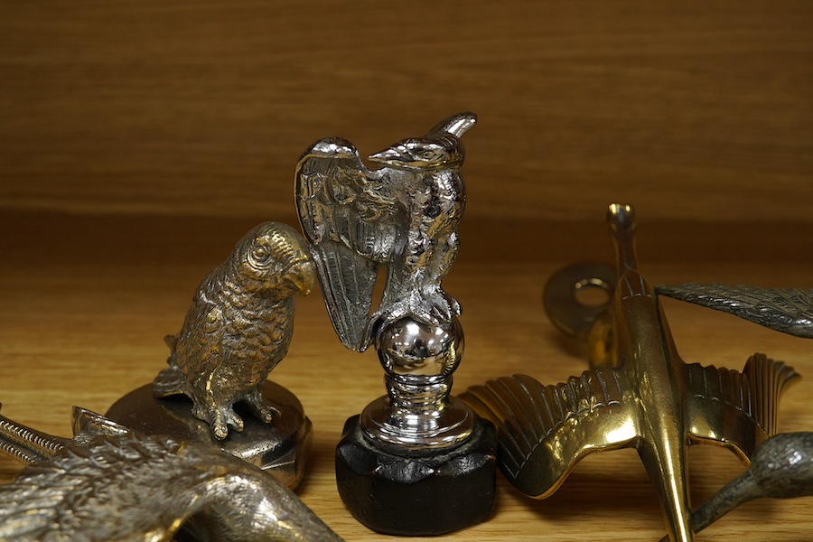 Six bird themed car mascots, including an Hispano Souza style flying stalk, a small parrot, a flying crane, an eagle perched on a ball, and a 14th/20th King’s Hussars crowned eagle, some examples chromed. Condition - fai